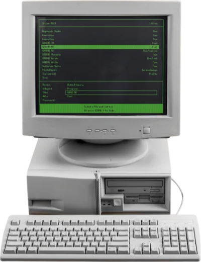 Vintage desktop computer displaying green text on a dark screen