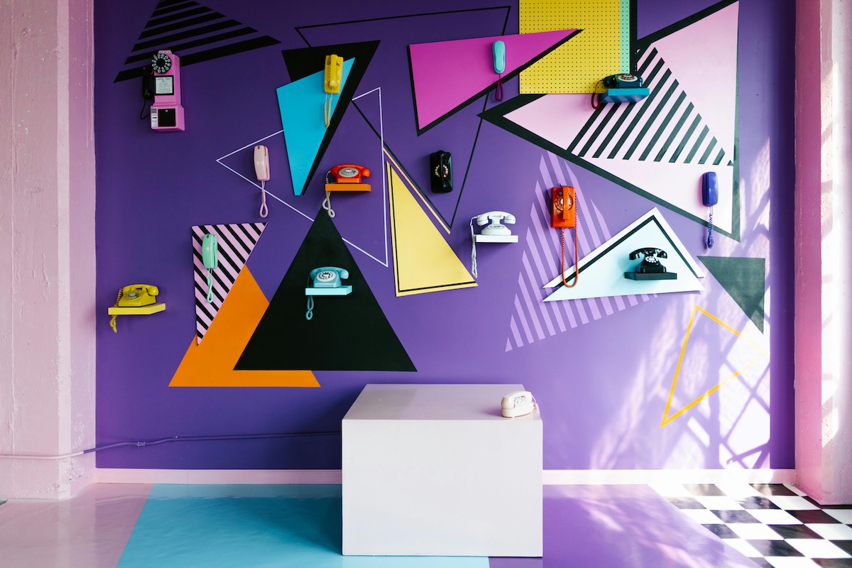 phones on a colored wall